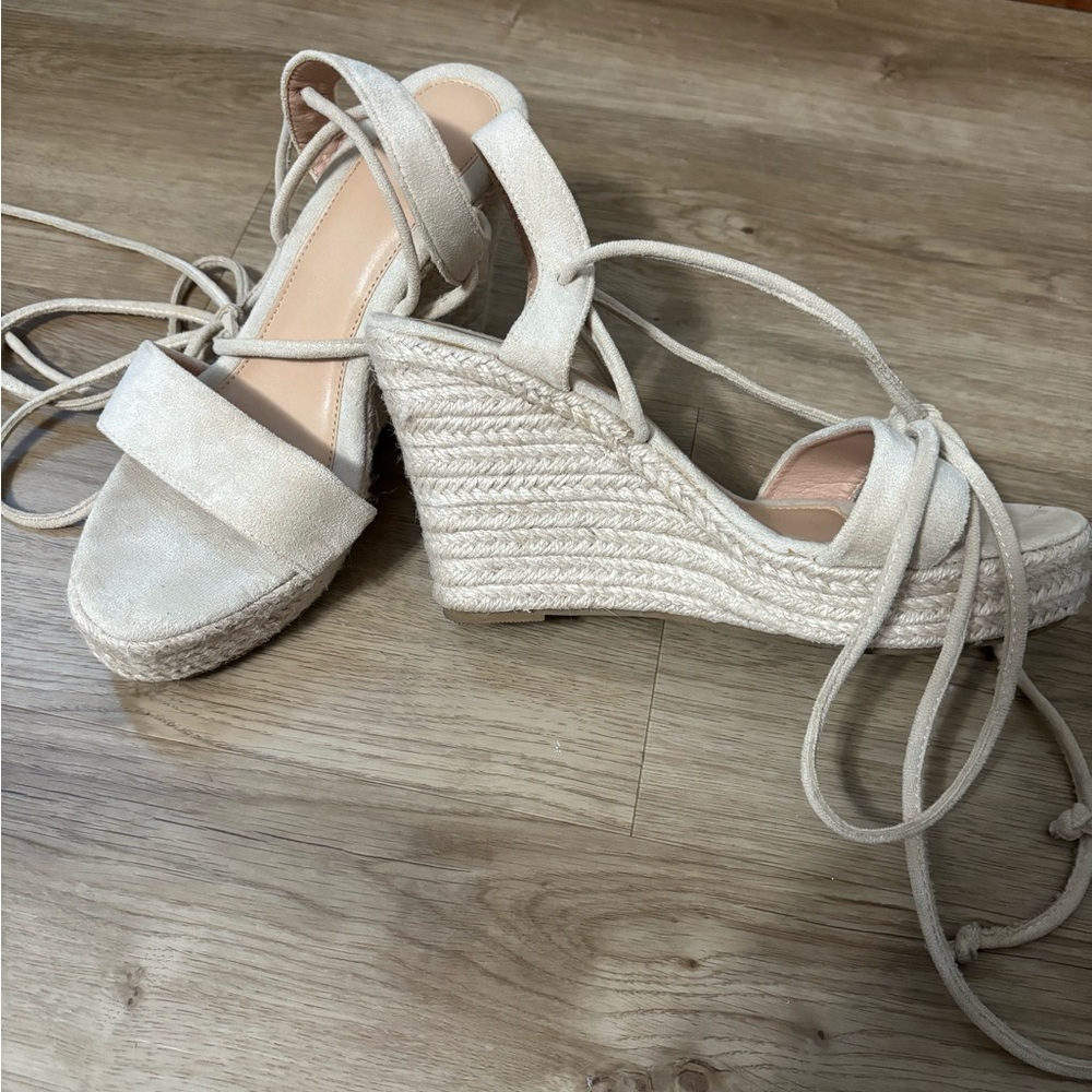 Wedge Sandals that tie up your calf. Size 8 in women’s shoes